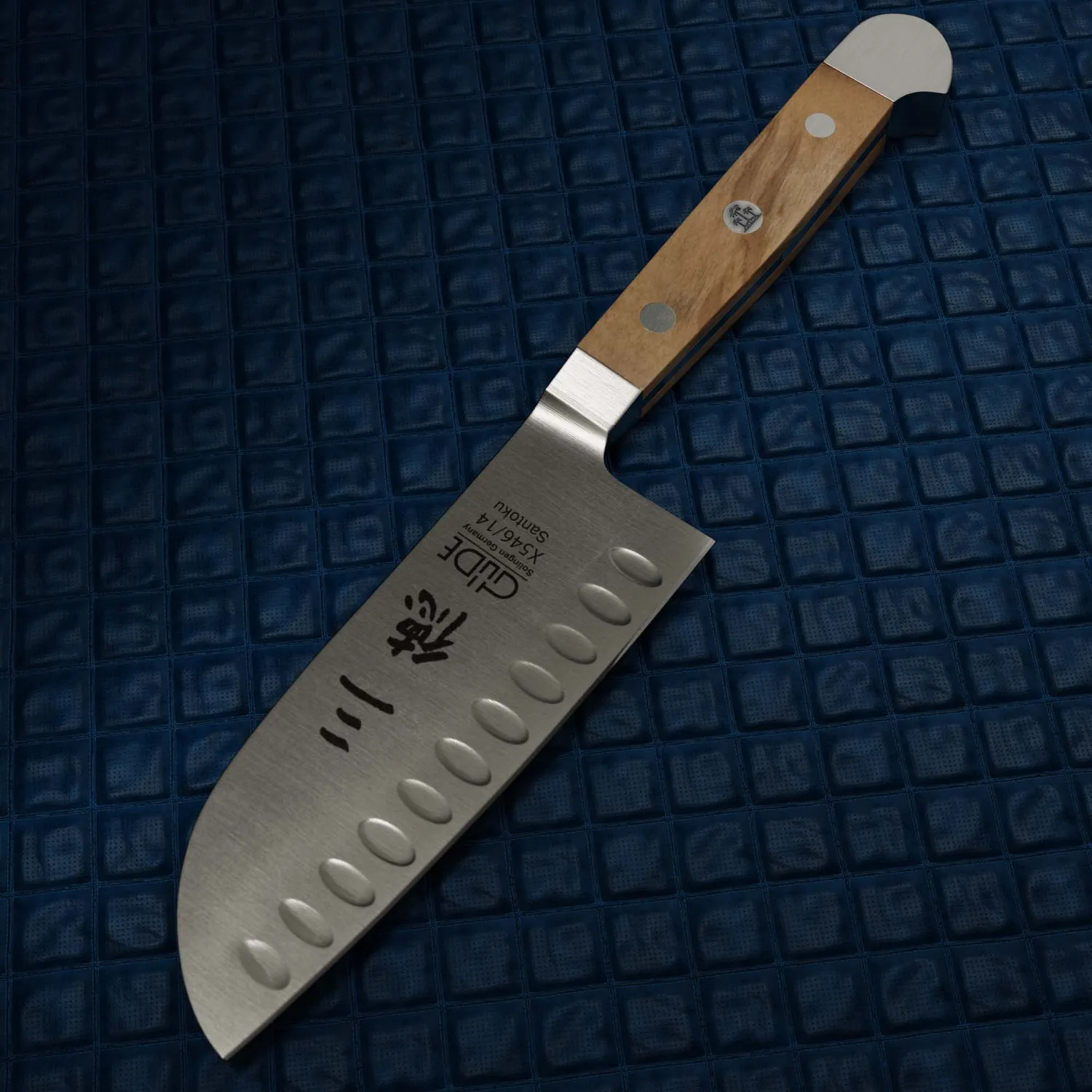 Güde Alpha-Olive Santoku alveolato 14 cm ulivo
